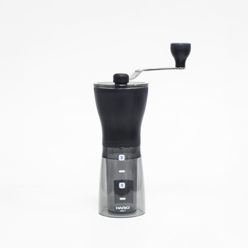 Molinillo de café manual Hario Mini Mill Slim+ MSS-1, cuerpo de acrílico negro translúcido